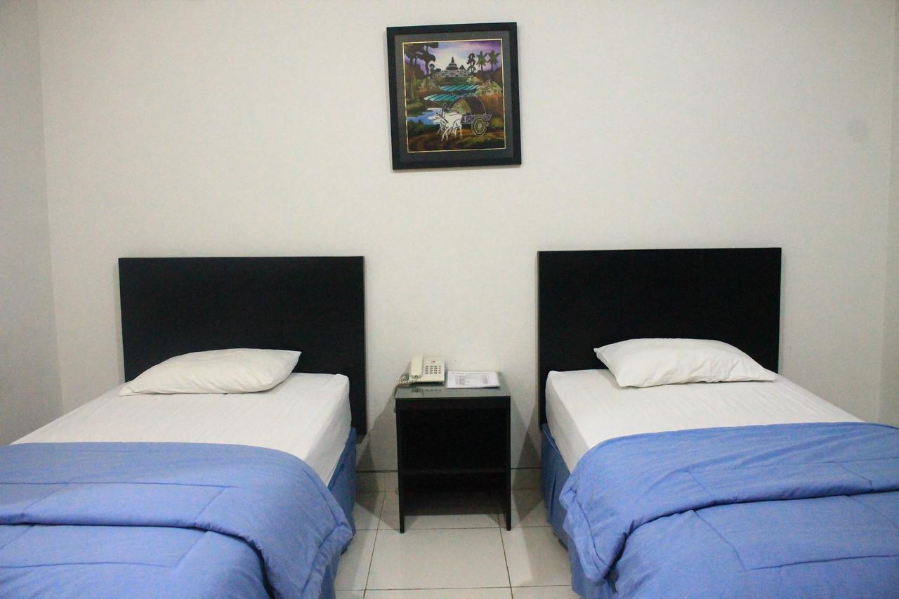Carica Homestay Surabaya Esterno foto